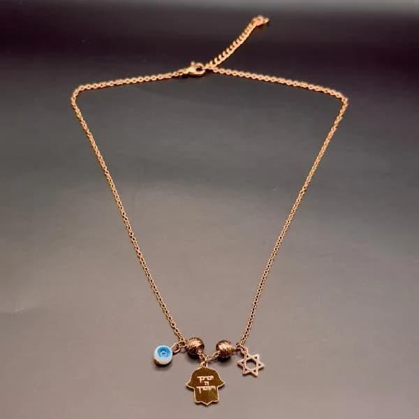 Hamsa Charm Necklace with Evil Eye and Star of David by Koch La Ni in Multiple Colors