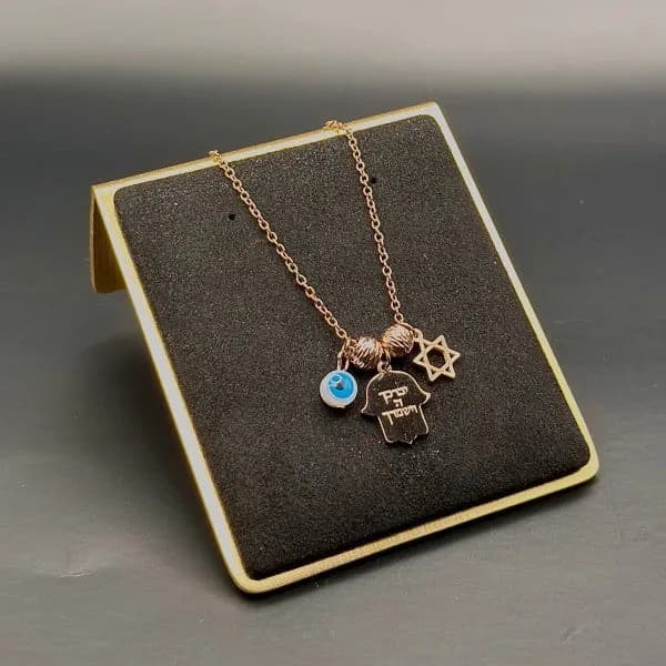 Hamsa Charm Necklace with Evil Eye and Star of David by Koch La Ni in Multiple Colors